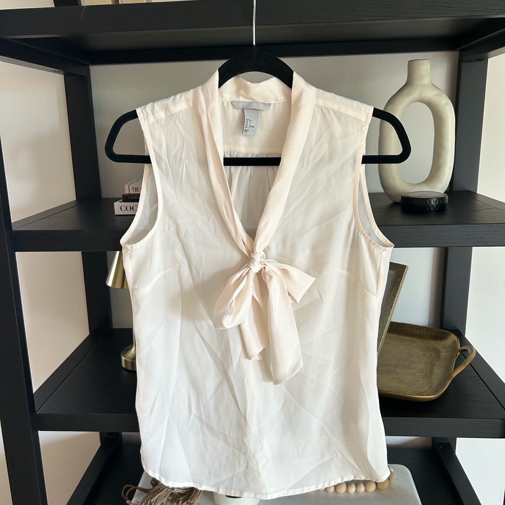 Elegant Cream Sleeveless Blouse